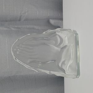Glass praying hands